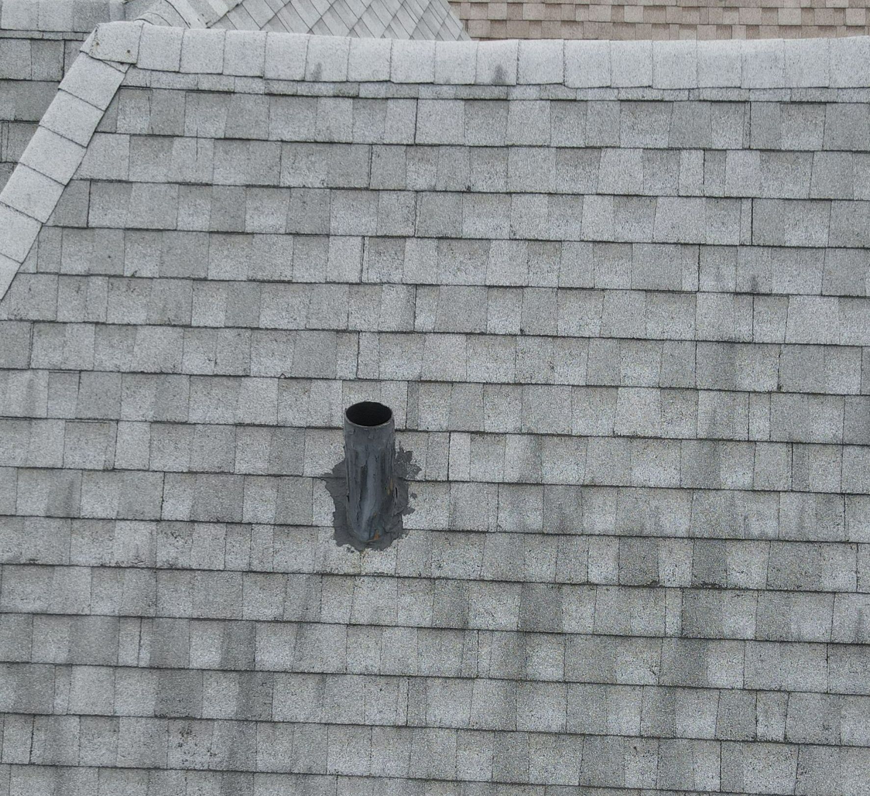Why Proper Boot Installation Around Waste Stacks Matters for Commercial Shingle Roofs in Chicago