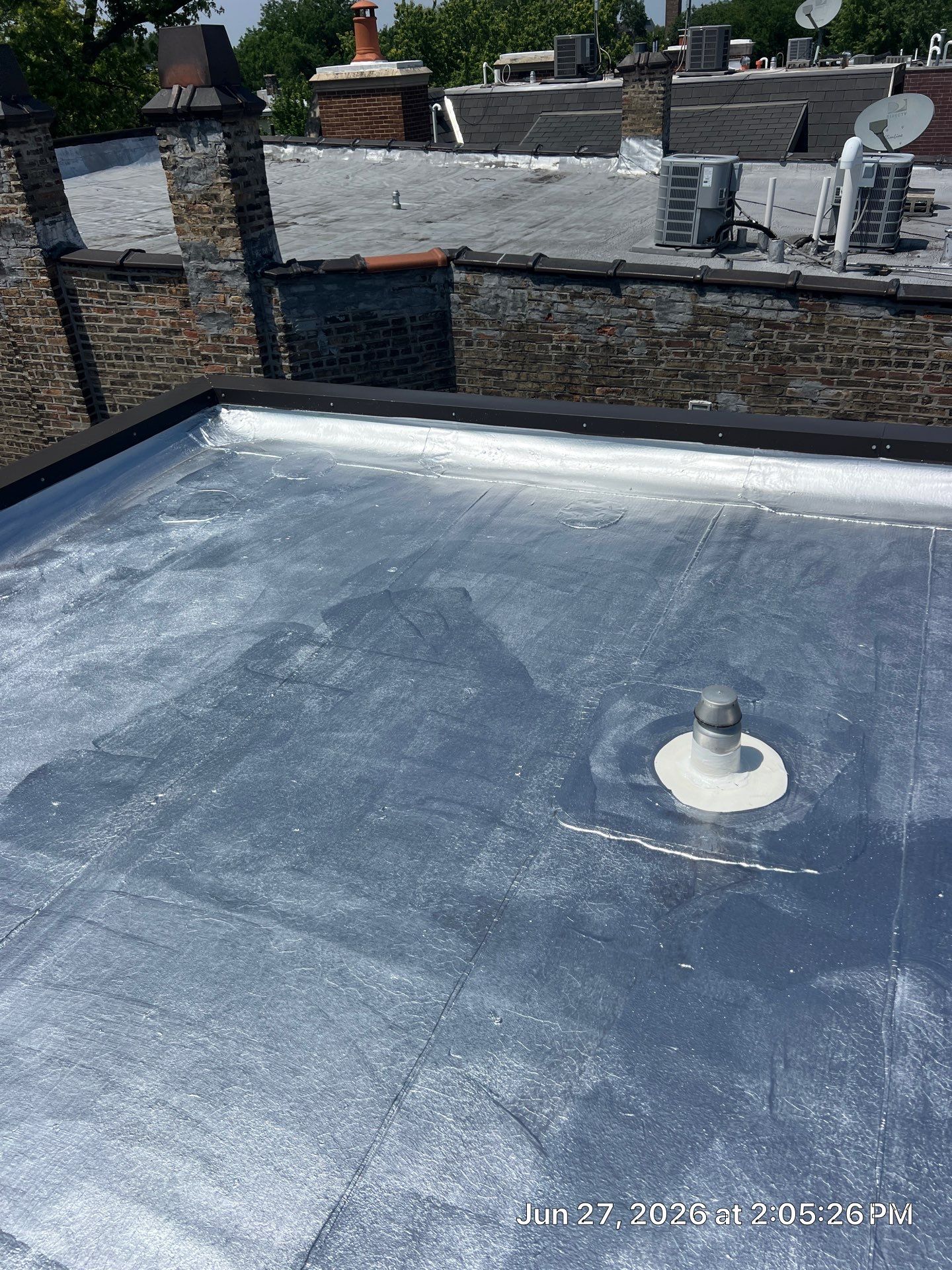 Will a Reflective Coating on My Flat Roof Actually Keep My Chicago Home Cooler?